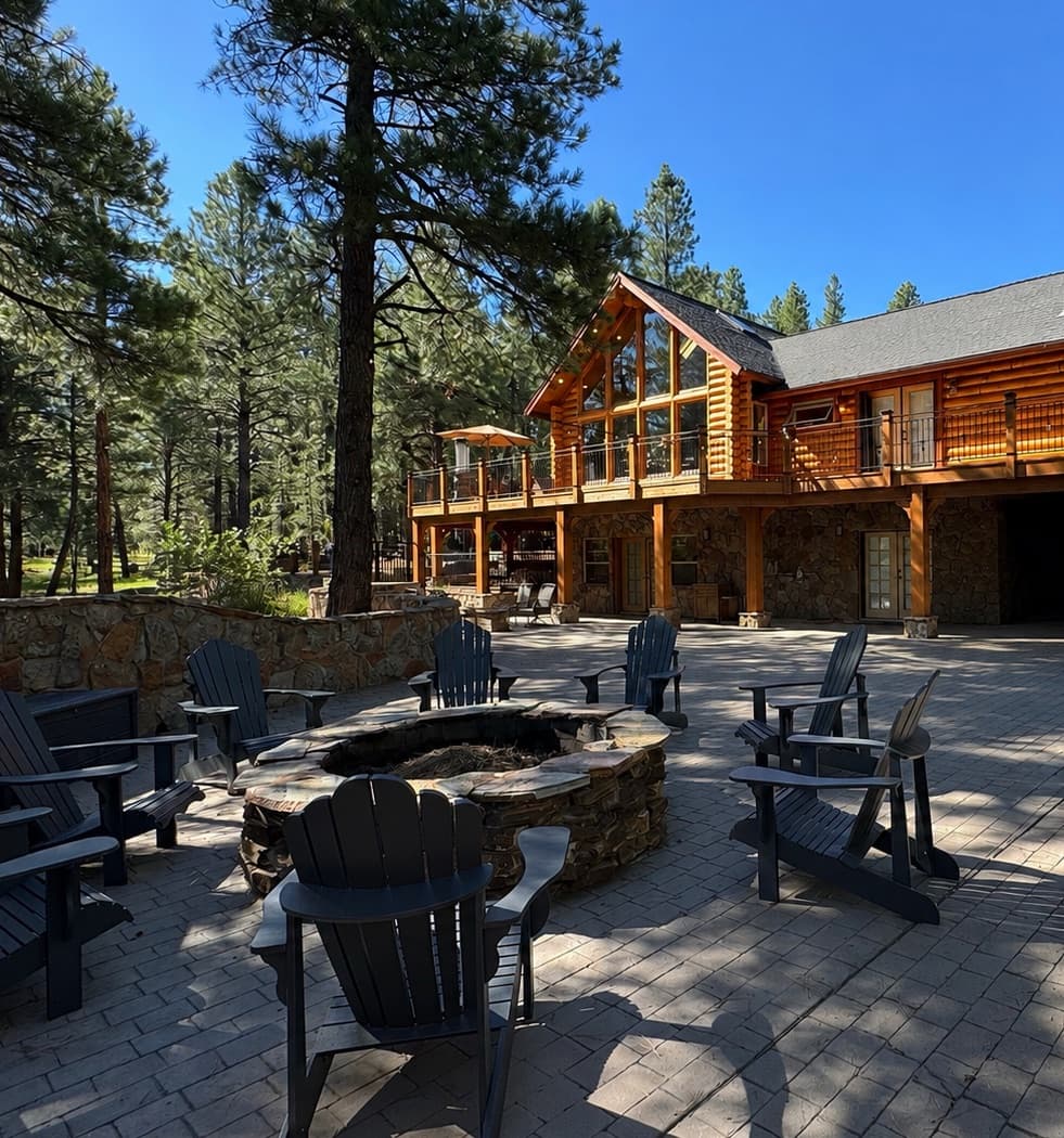 Exterior of the Northern Arizona cabin with a fire pit patio